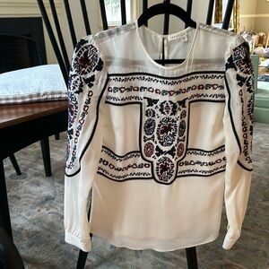 Veronica Beard Silk Blouse size 2 cream colored with black/blue/red embroidery